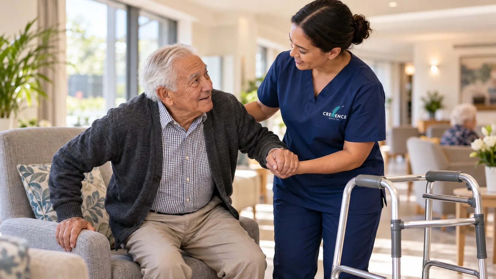 A healthcare assistant helping an older man stand up from his armchair